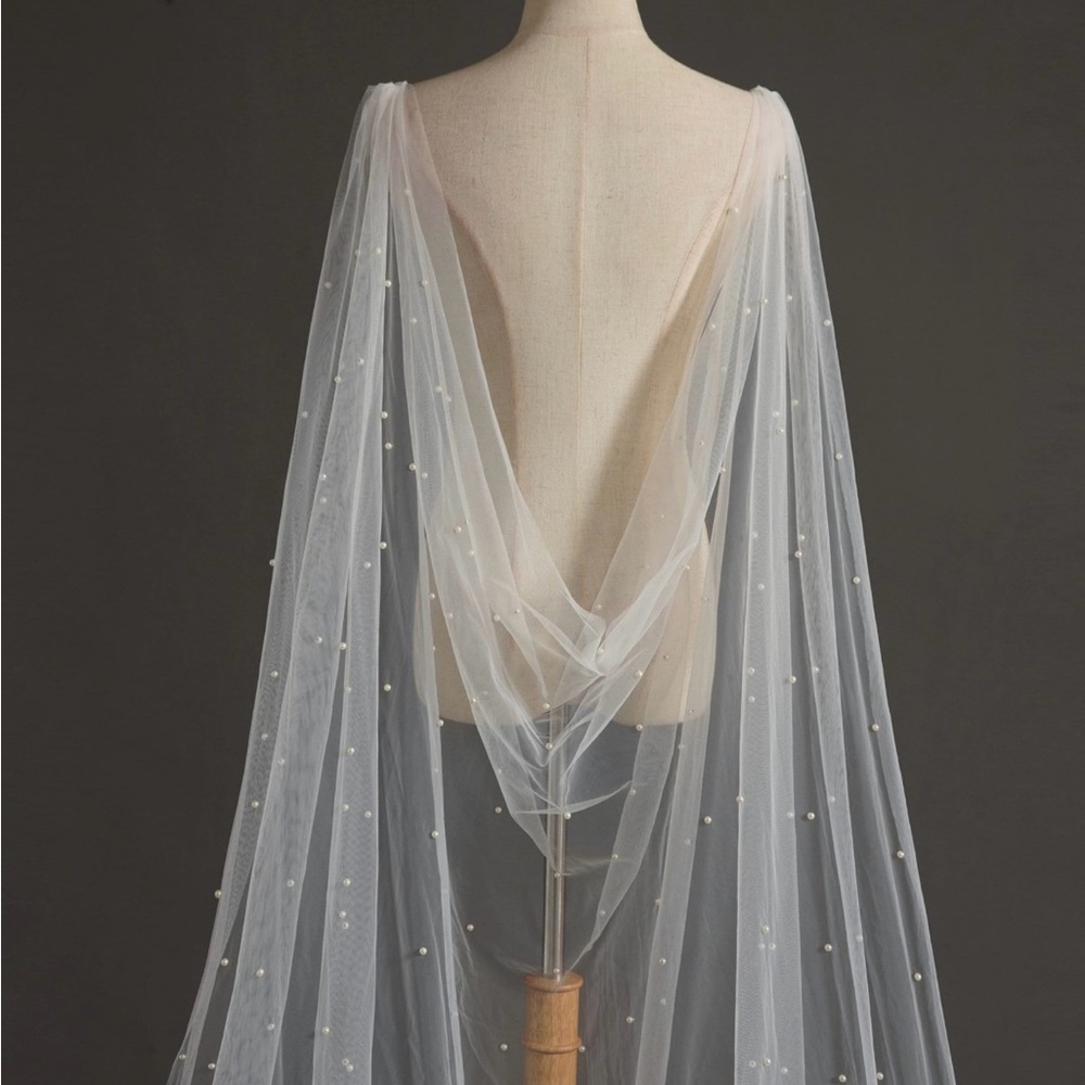Stunning tulle wedding cape with faux pearls